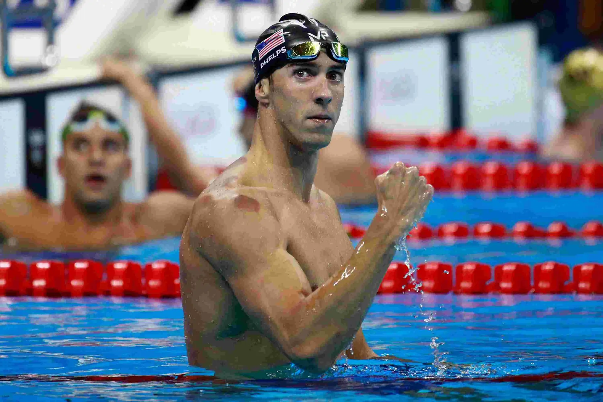 MICHAEL PHELPS: OLYMPIC GOD OF THE POOL AND WATER’S GREATEST CHAMPION
